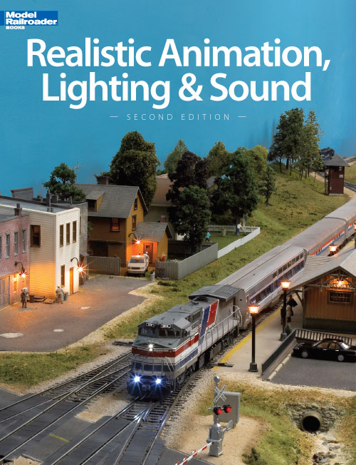 realistic animation lighting and sound cover shows a layout with lights on bulidings, lamp posts and a passenger train