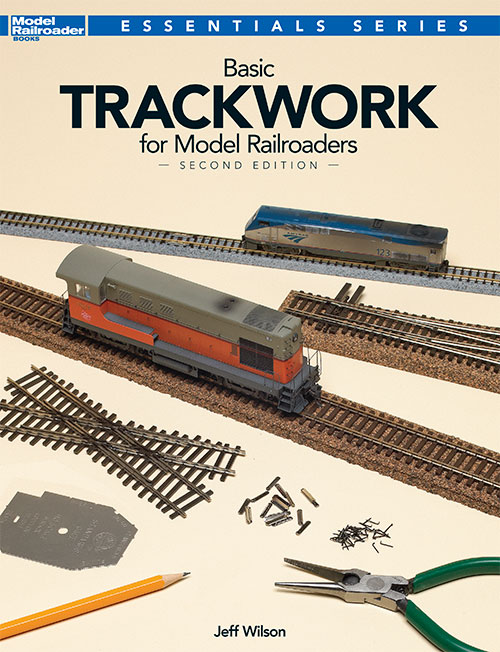 Basic trackwork for model railroaders cover shows a variety of track and tools