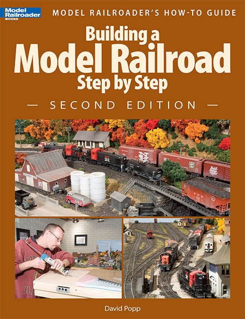 building a model railroad step by step cover shows a variety of photos of a layout in progress