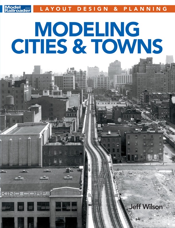 modeling cities and towns cover showing a black and white photo of a city by a railroad