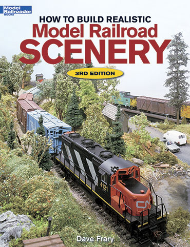 How to build realistic model railroad scenery cover shows a photo of a ho layout