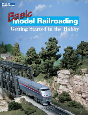 the cover shows a HO layout with an amtrak train on a bridge