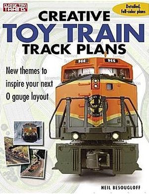the cover shows an o scale diesel locomotive and various layouts