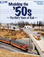 The book cover shows an HO scale layout featuring older style passenger and diesel locomotives