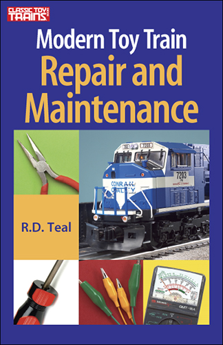the cover shows various tools and an o scale diesel locomotive